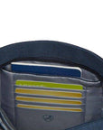 Close-up of RFID-blocking card slots inside the Travelon Anti-Theft Crossbody Bag for secure storage of credit cards and ID.