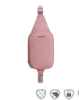 Travelon Anti-Theft Roam Compact Sling in blush pink with RFID protection, lockable zippers, and slash-resistant body from White-Balmer Shoes.