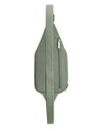 Side view of sage green Travelon Anti-Theft Roam Compact Sling with rear zipper and adjustable crossbody strap.