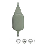 Travelon Anti-Theft Roam Compact Sling in sage green with anti-theft features including RFID blocking and cut-resistant strap.