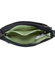 Interior of black Travelon Anti-Theft Roam Crossbody Bag featuring light green lining and organized compartments for convenience.