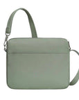 Back view of sage green Travelon Anti-Theft Roam E/W Crossbody Bag with simple design and adjustable strap for travel convenience.
