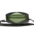 Interior view of black Travelon Anti-Theft Roam Belt Bag showing organized compartments and RFID-blocking lining for secure travel storage.