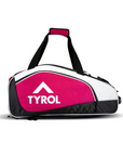 A pink TYROL sports bag with dual handles and multiple compartments.