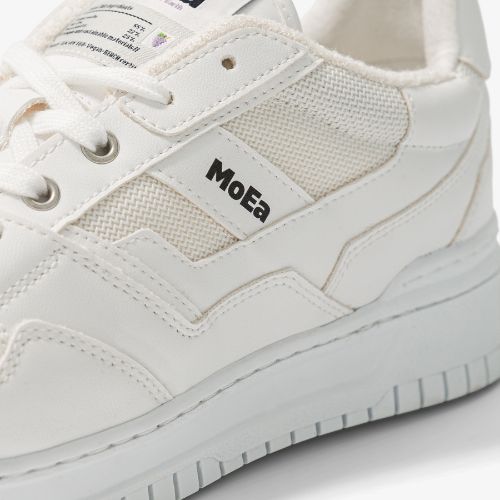 Close-up of Moea Gen1 Grape Vegan Sneakers side panel with mesh and logo, showcasing sustainable materials and stylish lace-up design.