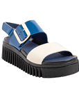 Blue and white backstrap sandal with a thick black ribbed outsole.