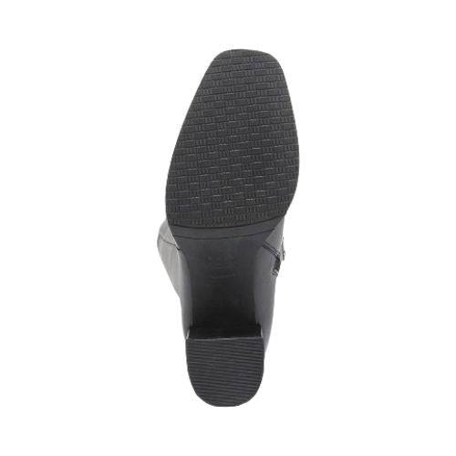 Black treaded outsole with block heel.