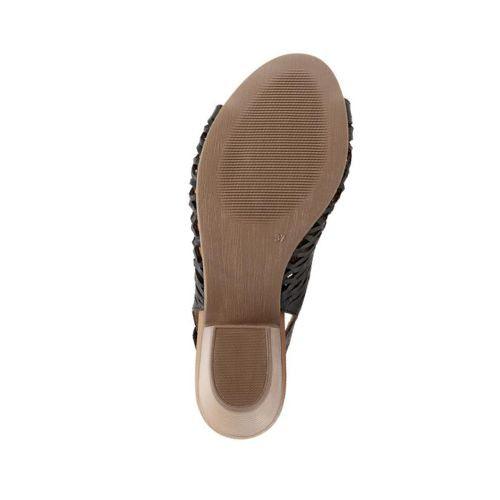 Brown outsole of the Lacey sandal in black. Textured slightly for grip.