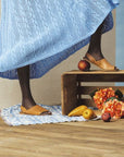 Model wearing tan Bueno Hayden Sandals styled with a blue dress, showcasing versatile summer footwear handmade in Istanbul.
