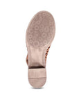 Outsole view of the Bueno Olsen slingback heeled sandal in tan, highlighting the textured sole and sturdy heel for enhanced grip and stability.
