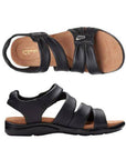 Pair of Black backstrap sandals with two adjustable Velcro straps with scrunched details, small silver embellishments, tan Clarks logo'd footbed and black outsole.