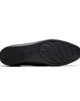 Black rubber outsole with Clarks logo.