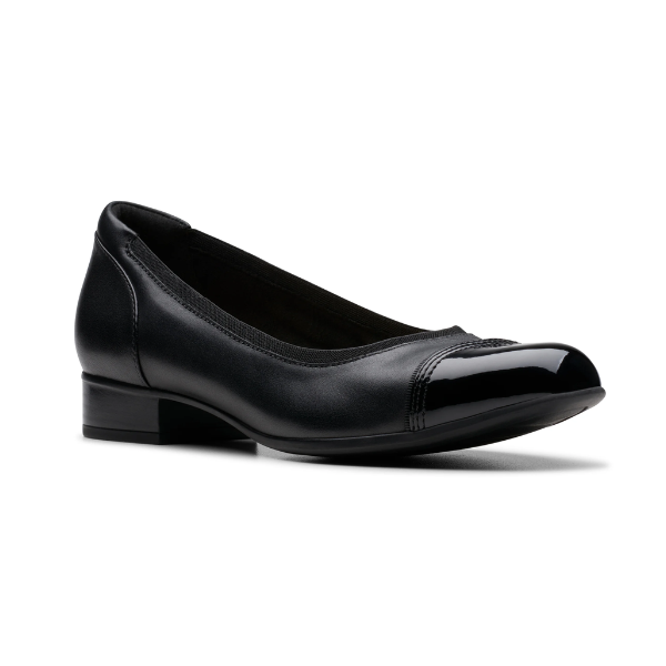 Black leather ballet flat with slight stacked heel and patent toe.