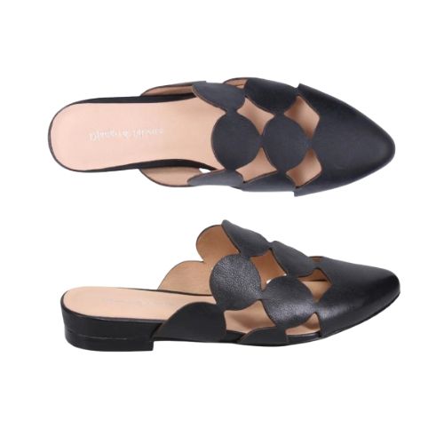 Pair of Leather Mules in black with circular cutout design, beige logo'd footbed and low heel.