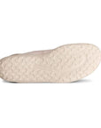 Pink rubber outsole of sporty ballet flat with bubbly texture tread and Ecco logo in middle.