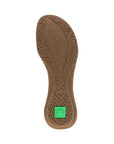 Sole view of El Naturalista N413 sandal with detailed cork tread and green logo, emphasizing sustainable design and slip resistance.
