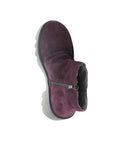 Aerial of purple ankle boot with a heel, made of genuine leather, with a zipper on the side and a lugged rubber sole.