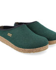 Kris Wool Clog in Blue. A dark blue wool upper with a grey band, cork midsole, and a brown rubber outsole. A small brass badge with the Haflinger logo is stitched to the side.