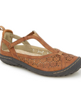 A Mary-Jane Flat with floral cut-out design, adjustable strap, and durable outsole.