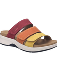 Slide sandal with three Velcro straps, each a different color; pink, orange and yellow, with tan Josef Seibel logo'd footbed, thick white midsole and black outsole.