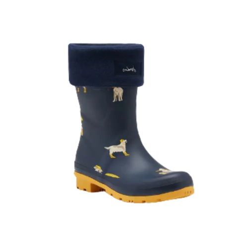 Molly Boot Socks inside of a blue rubber boot, with the cuff pulled over the opening of the boot.