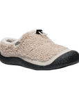 Women's KEEN Howser III Slide Clog in beige fleece with black sole, combining slipper-like warmth with durable outdoor-ready design.