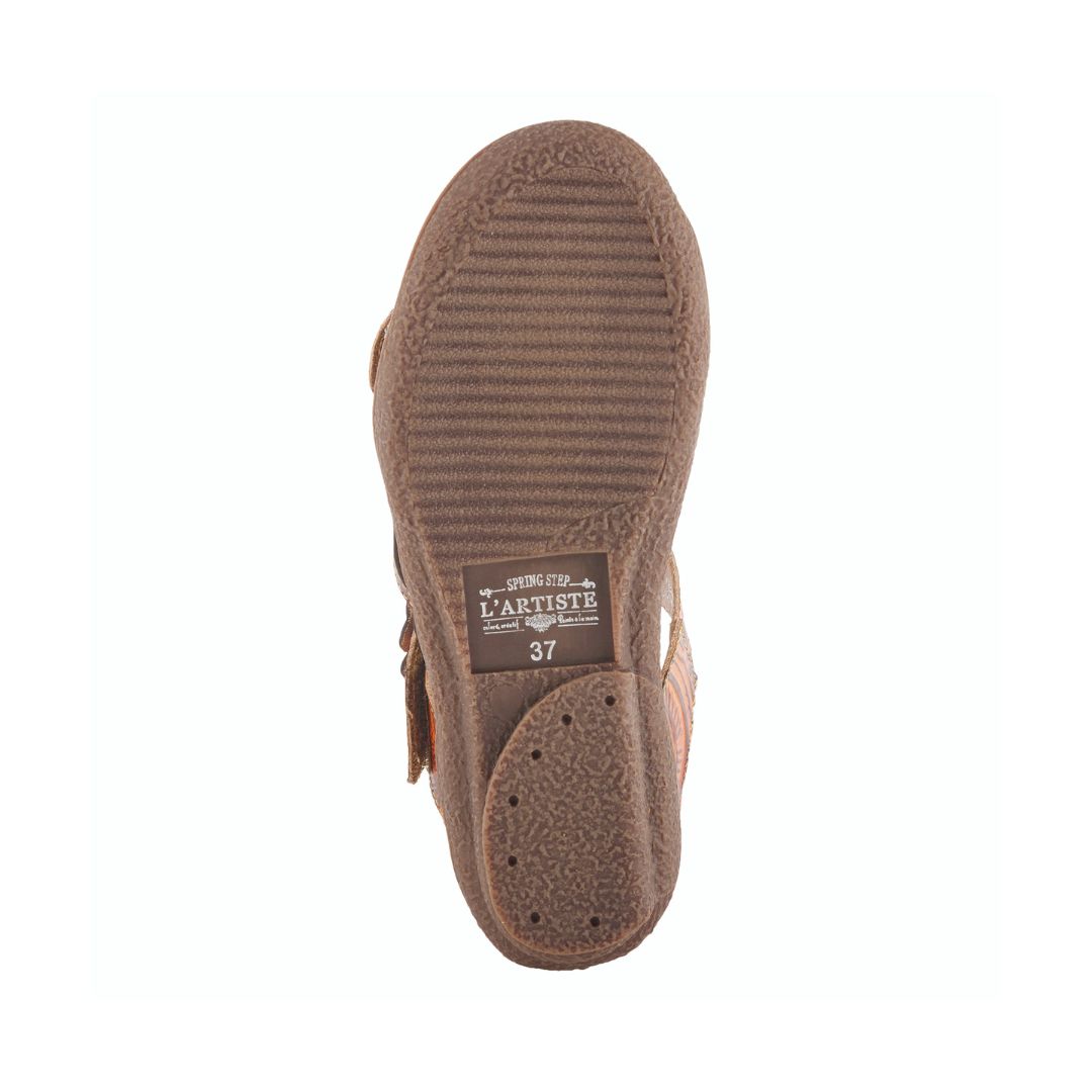 Bottom sole of the Women's L'Artiste Aymee Sandal with textured rubber grip and L'Artiste logo embossed near the heel.