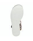 Outsole view of the women's L'Artiste Laga backstrap sandal showing white textured rubber sole for grip and durability.