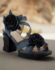 L'Artiste heeled Blue sandals displayed on a neutral surface.
