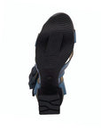 Black rubber outsole with light rounded tread and a block heel.