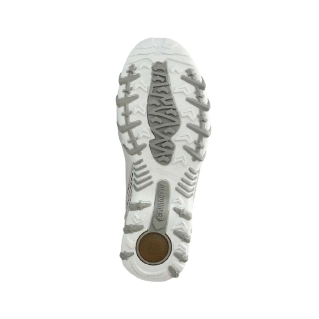Outsole view of the Women's Mephisto Niro Mary-Jane Sneaker in beige, highlighting the shock-absorbing tread for enhanced grip and durability.