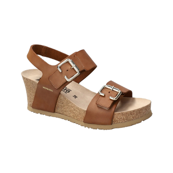 Women's Mephisto Lissandra Wedge Sandal in tan leather with cork wedge heel. Features silver buckles and cushioned insole for all-day comfort.