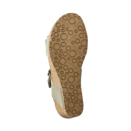 Outsole view of sage green Women's Mephisto Lissandra Wedge Sandal. Textured rubber sole with circular grip pattern for slip resistance.