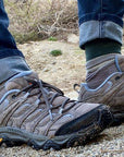 Women's Merrell Moab 3 WP Sneakers worn outdoors on a trail, demonstrating waterproof durability and comfort in real hiking conditions.