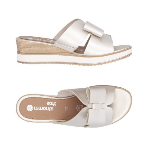 Side and top view of beige Rieker D6456 women's platform wedge sandal, featuring soft leather upper and ergonomic footbed.
