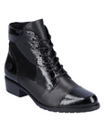 Lace-up leather boot in black with patent accents and a low heel.