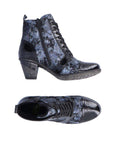Top and side views of Women's Remonte D8797 heeled ankle boot showing lace-up design, inside zipper, and textured leather finish.