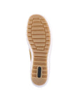 Outsole view of yellow Women's Remonte R1432 Lace-Up Sneaker showing grippy rubber sole for stability and everyday traction.
