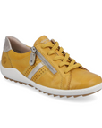 Yellow Women's Remonte R1432 Lace-Up Sneaker with beige heel patch, side zipper, and breathable leather for stylish daily wear.