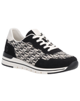 Black and white woven upper sneaker with faux suede black accents, white laces and lining and a white midsole with black line through it.