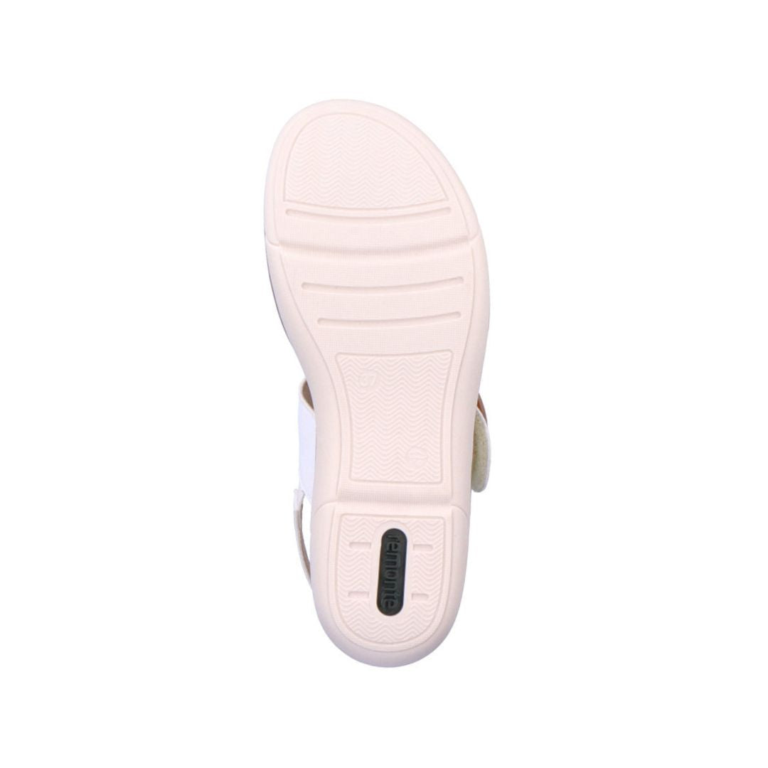 Bottom sole of Rieker R6853 Backstrap Sandal in white, designed with shock-absorbing grip and flexible support for everyday wear.
