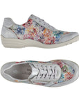 Top and side views of silver multicolor Remonte R7637 Lace-Up Sneaker for women, featuring flexible upper and cushioned sole.