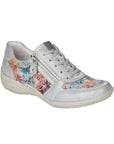 Women's Remonte R7637 Lace-Up Sneaker in silver with multicolor pattern, stretch material and side zipper for bunion-friendly fit.