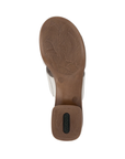 Brown wavey pattern tread and green Remonte logo on block heel outsole.