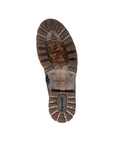 Brown lugged outsole, slightly translucent with green Remonte logo on heel.
