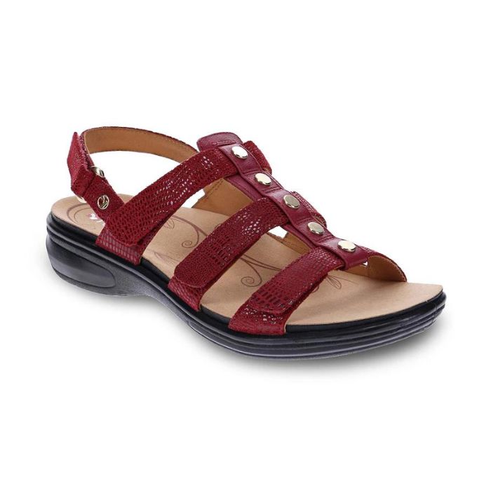 Red strappy sandal with four adjustable straps. Sandal has stud details and a black outsole.