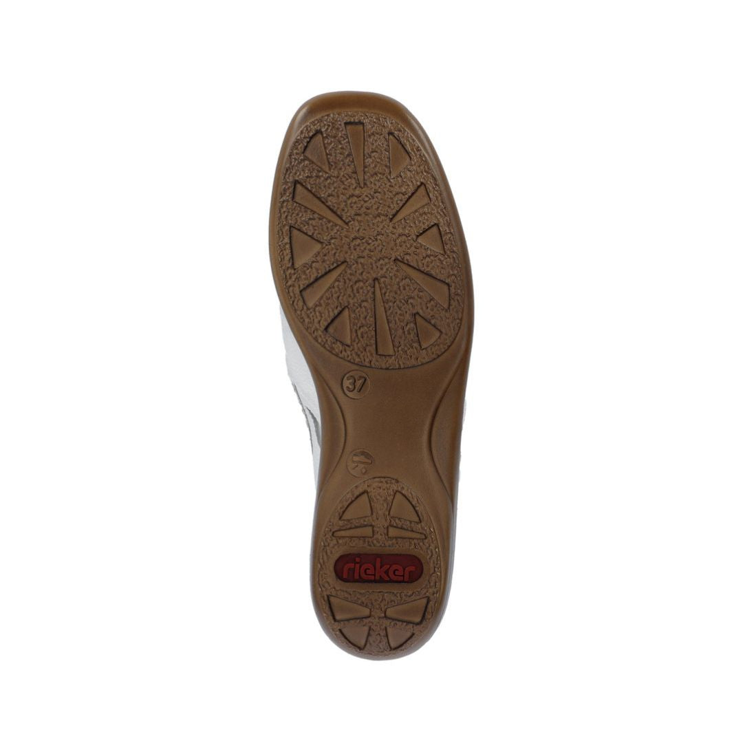 Outsole of loafer with textured grip and red Rieker logo on heel.