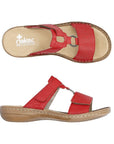 Pair of Red slide sandals with two Velcro straps, textured details and medallion accent, tan Rieker logo'd footbed and brown outsole.