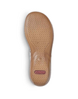 Tan lightly textured outsole with red Rieker logo on heel.