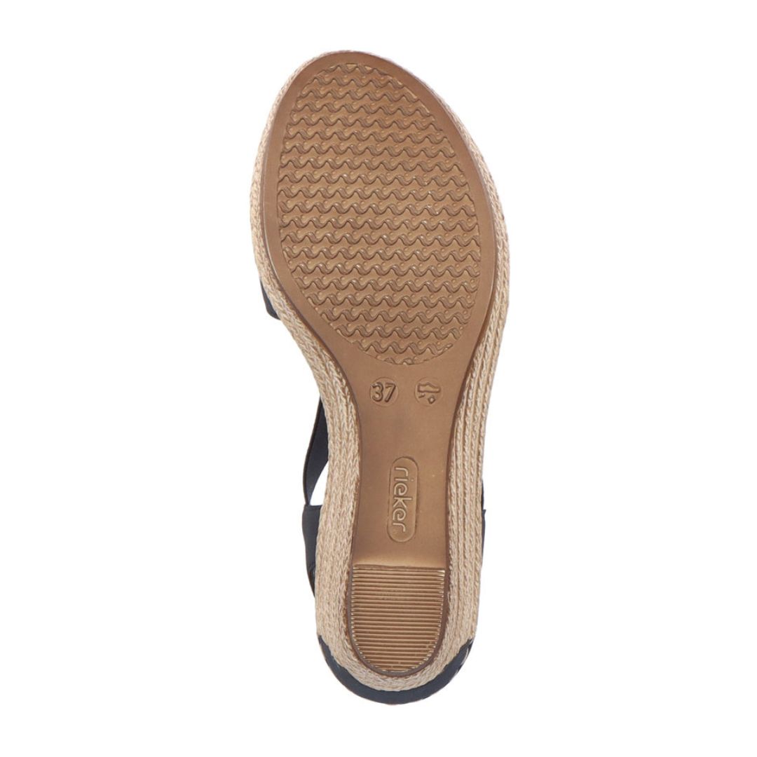 Bottom sole of navy Rieker 624H6 Sling-Back Wedge Sandal with anti-slip tread. Designed for stability and comfort.